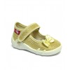 Gold shoes with a bow