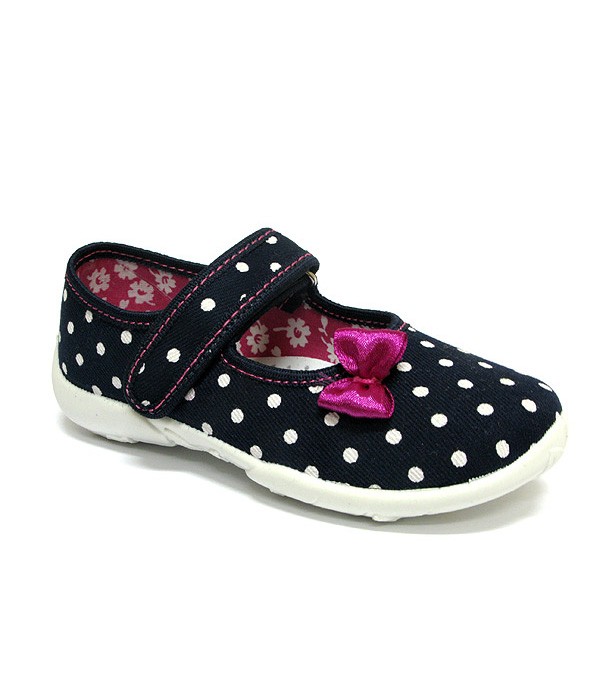 Supportive shoes for a preschool girl with white polka dots